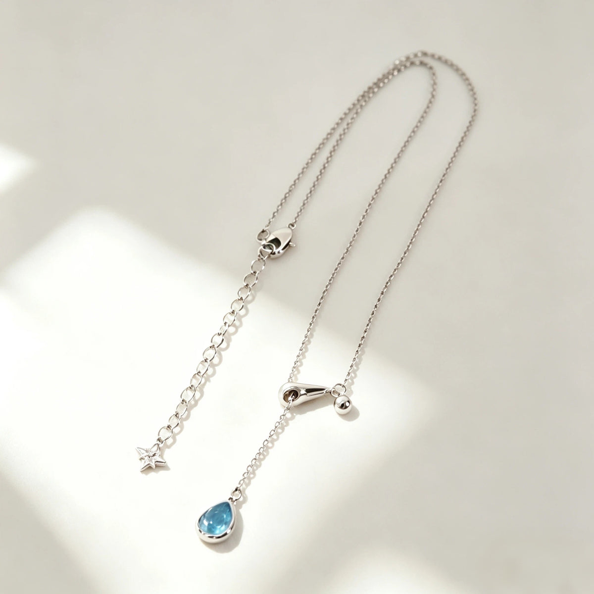 POFFLET Afterglow Drop Necklace in Sky Silver