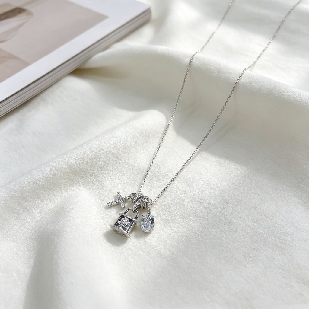 POFFLET Lucky Little Things Necklace detail view